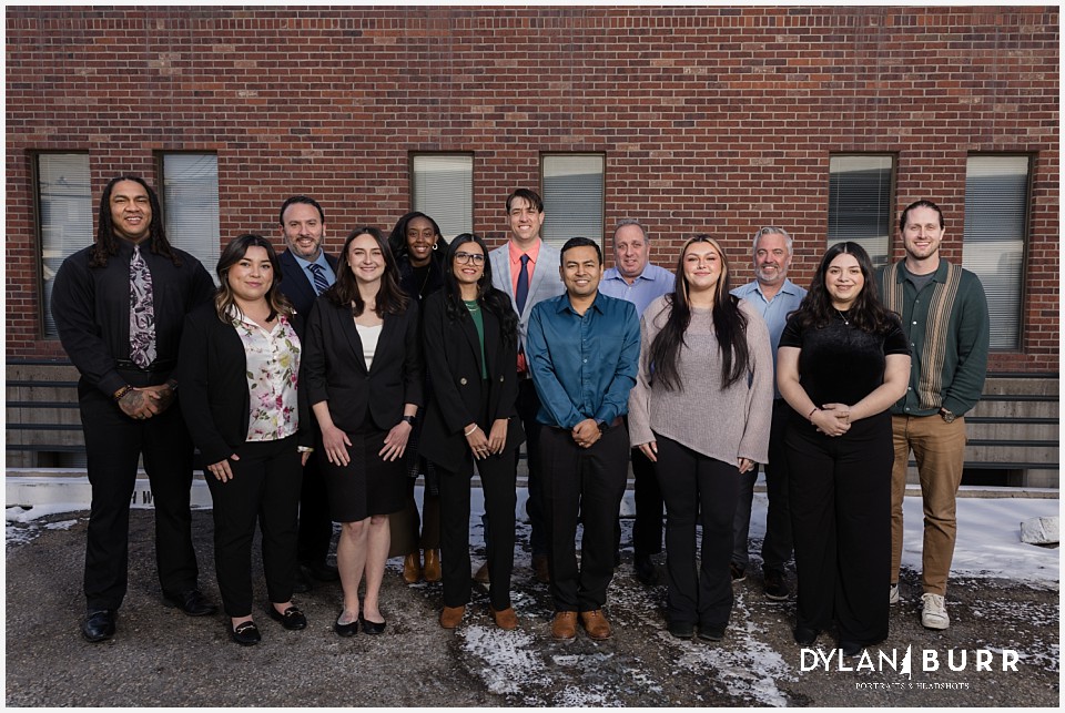 3.0 Property Management Team Group Photo outside apartment building